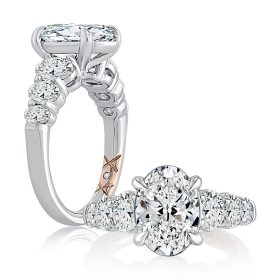 Classic Four Prong Oval Cut Diamond Flanked Engagement Ring